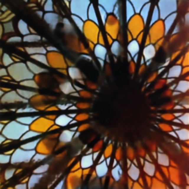 Mandala reconstruction from the broadband metalens under dirt obstruction