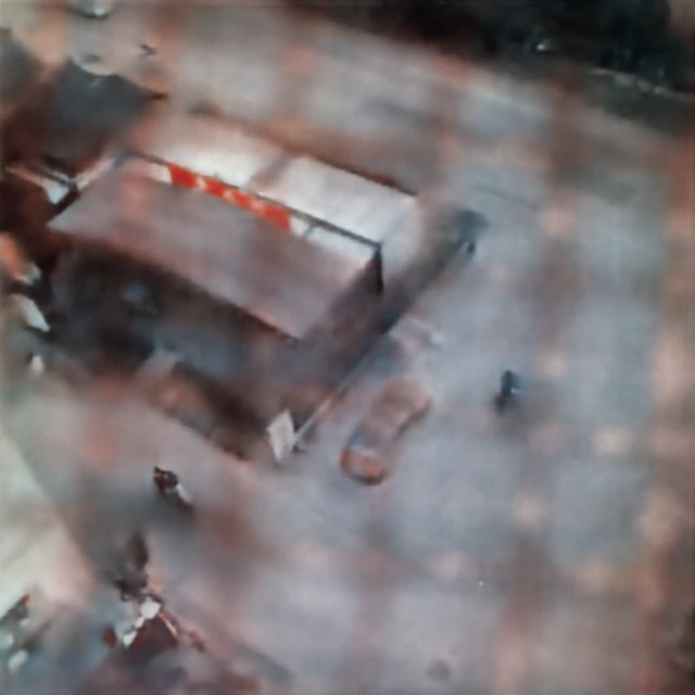 Fence-obstructed VisDrone input captured through the proposed metalens